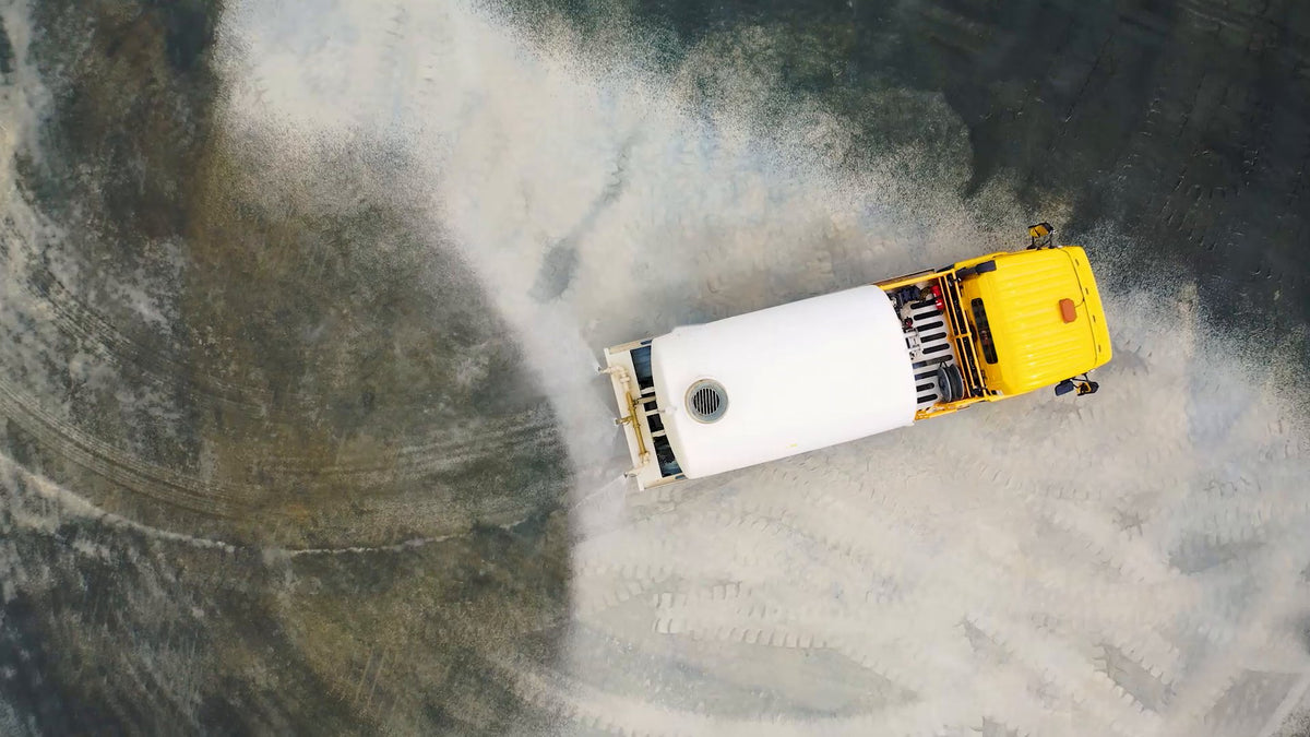 Promax dust suppression unit spraying a haul road, from above