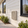 Water switch mounted on a weatherboard wall