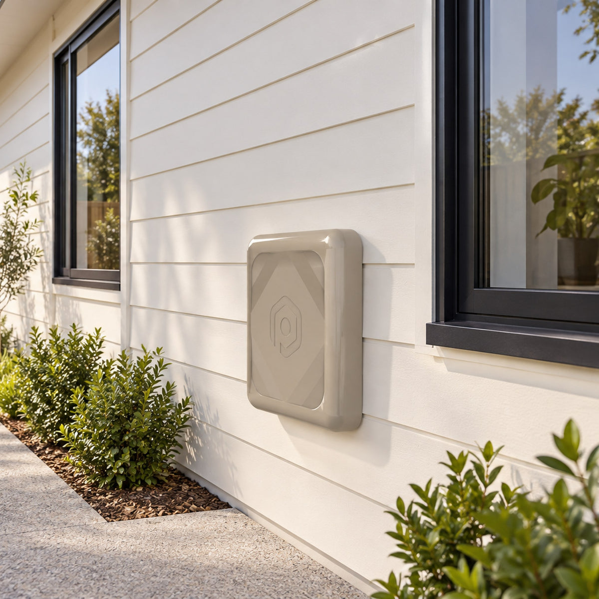 Water switch mounted on a weatherboard wall